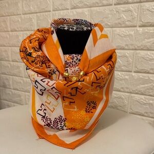 #158. Orange Patterned Scarf with Gold Accents